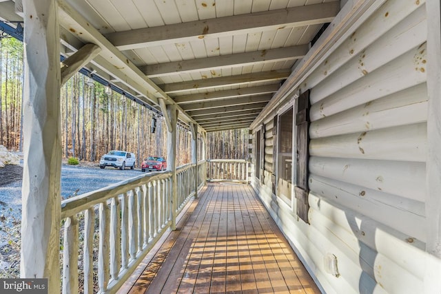 wooden terrace featuring a porch