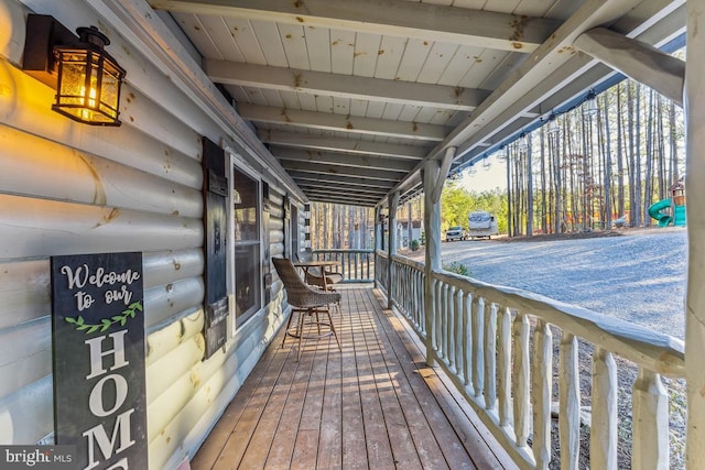 wooden terrace with covered porch