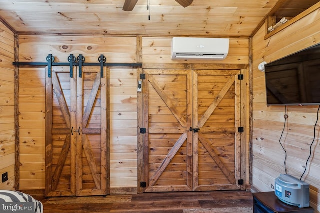 view of gate featuring an AC wall unit