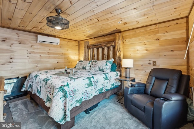 bedroom with a wall mounted air conditioner, wood ceiling, wooden walls, and carpet flooring