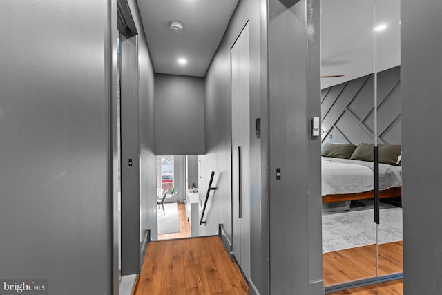 hallway featuring hardwood / wood-style floors