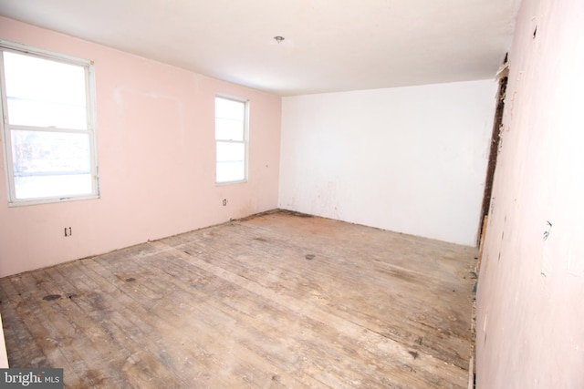 unfurnished room featuring a wealth of natural light