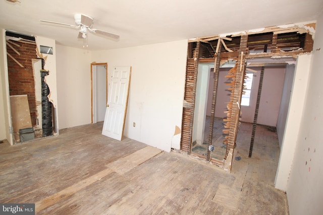 interior space featuring ceiling fan