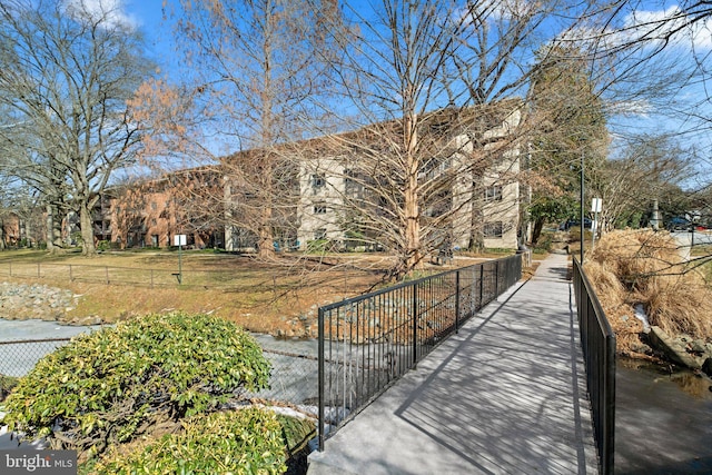 view of home's community featuring a water view