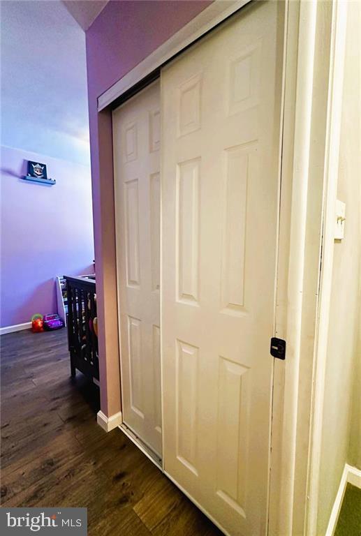 interior details featuring hardwood / wood-style flooring