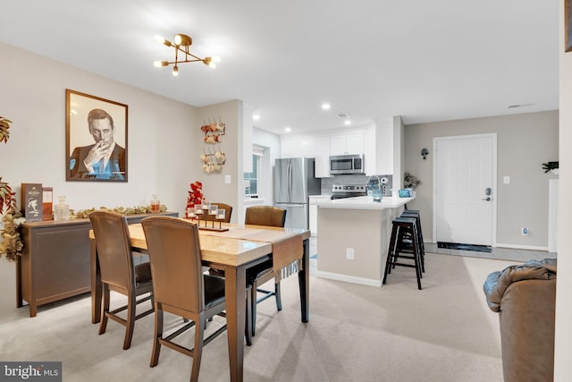 view of carpeted dining room