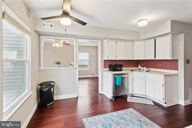 kitchen featuring ceiling fan, backsplash, dark hardwood / wood-style floors, white cabinets, and stainless steel dishwasher