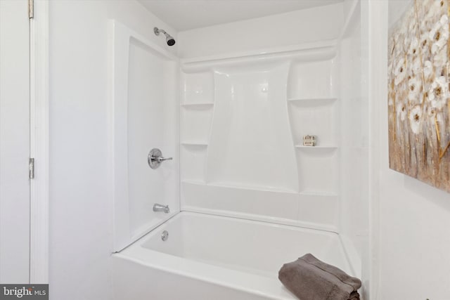 bathroom featuring shower / washtub combination