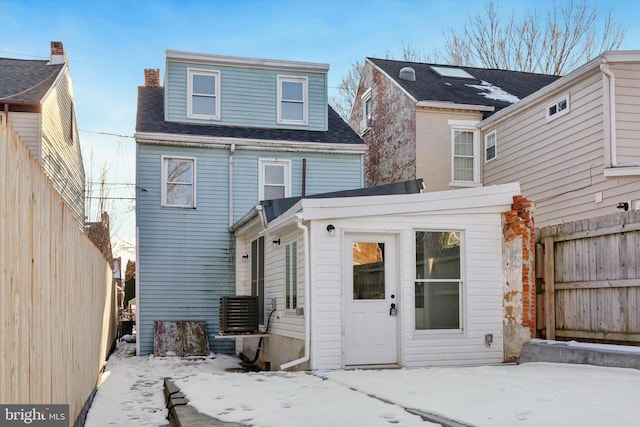 view of snow covered property