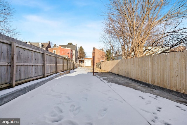 view of yard covered in snow