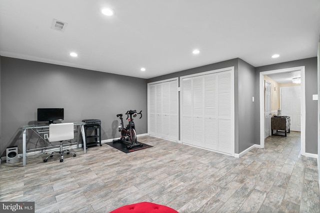 home office featuring light hardwood / wood-style flooring