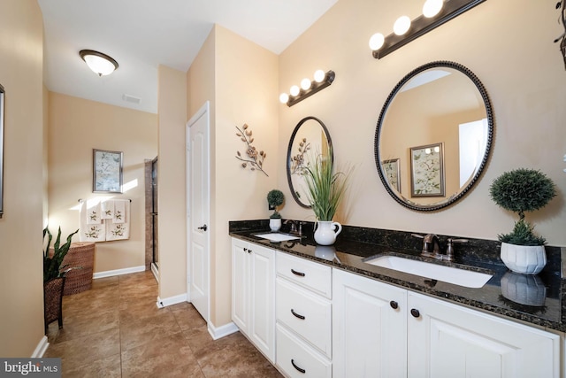 bathroom featuring vanity and tile patterned floors