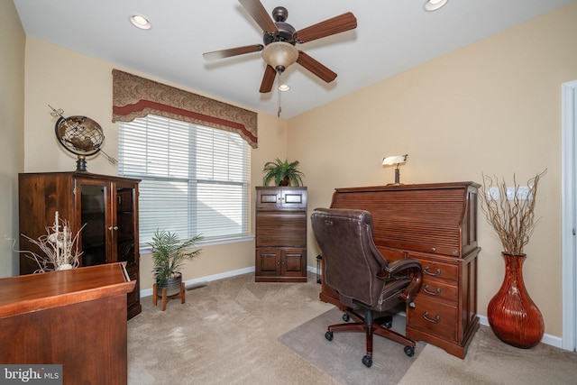 office with ceiling fan and light colored carpet