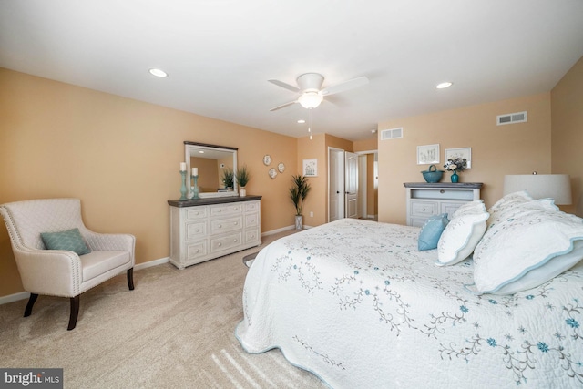 bedroom with ceiling fan and light colored carpet