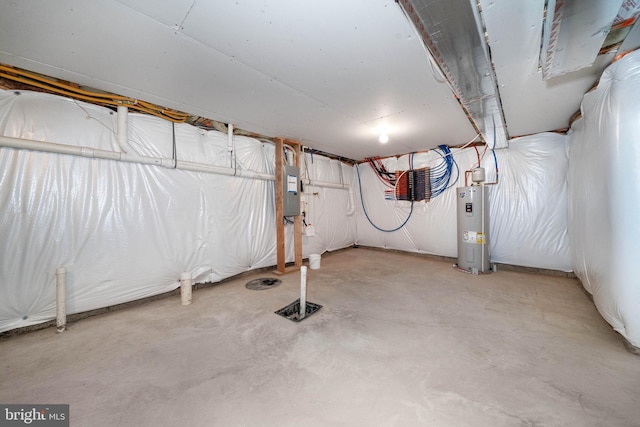 basement featuring water heater