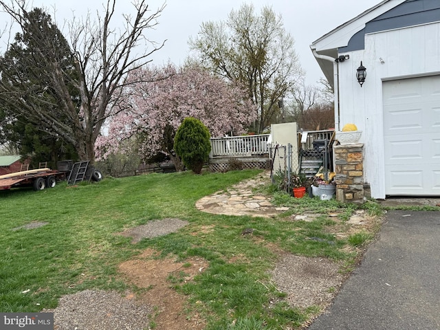 view of yard with a deck