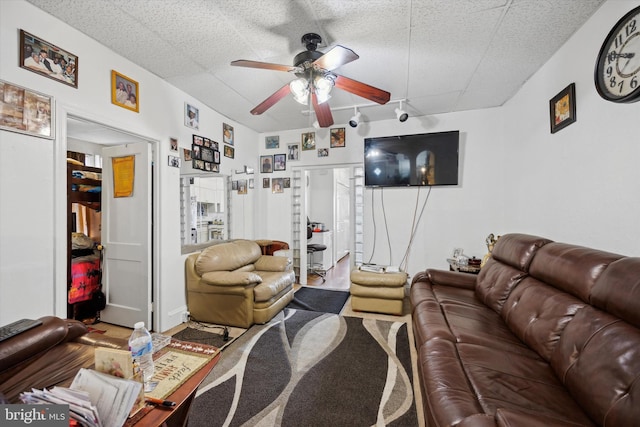 living room featuring ceiling fan