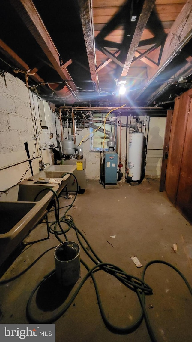 basement featuring water heater