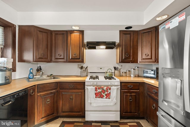 kitchen featuring extractor fan, black dishwasher, sink, gas range gas stove, and stainless steel refrigerator with ice dispenser