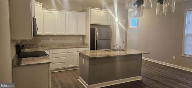 kitchen featuring a sink, dark wood-style floors, white cabinetry, and stainless steel appliances