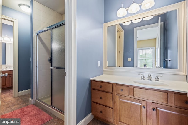 bathroom featuring vanity and walk in shower