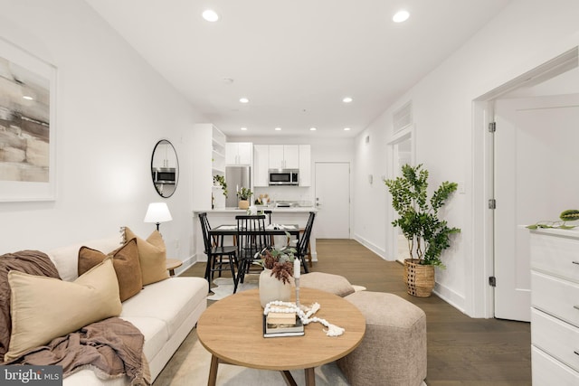 living room with hardwood / wood-style flooring