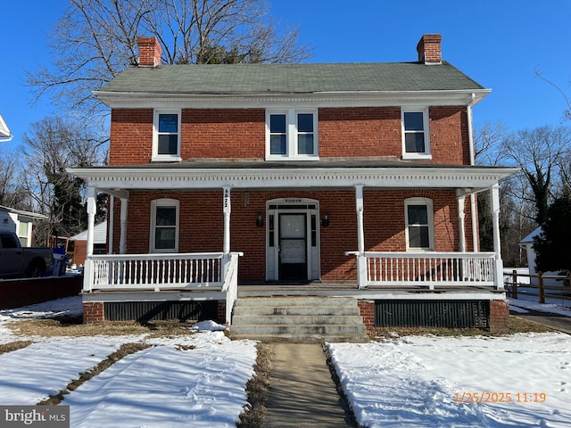 view of front of property featuring covered porch