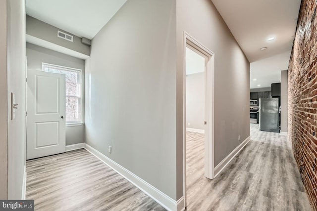 hall featuring light hardwood / wood-style floors