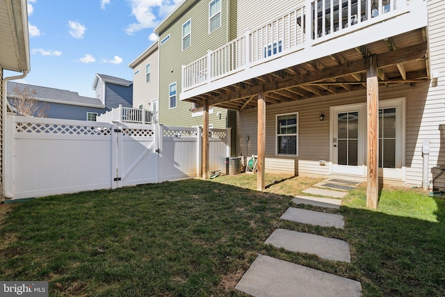 view of yard featuring a gate and fence