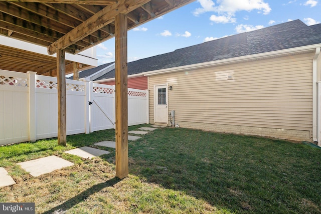 view of yard featuring fence