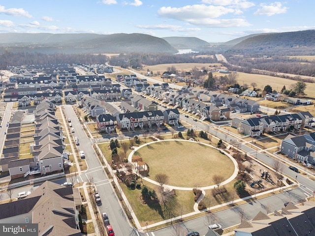 bird's eye view with a residential view and a mountain view