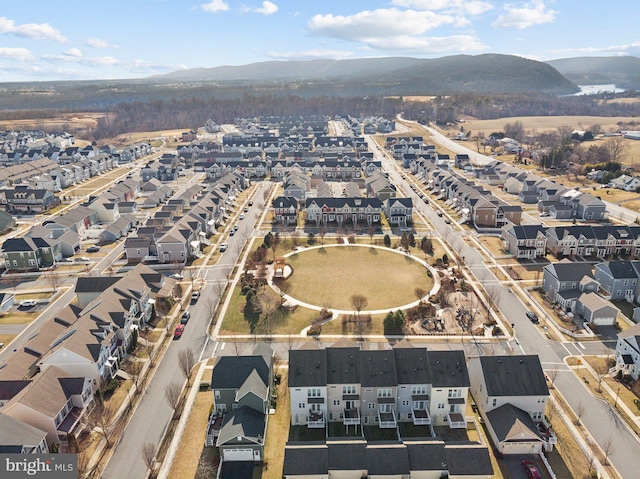 birds eye view of property with a residential view and a mountain view