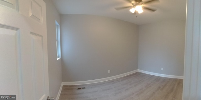 spare room featuring ceiling fan and light hardwood / wood-style floors