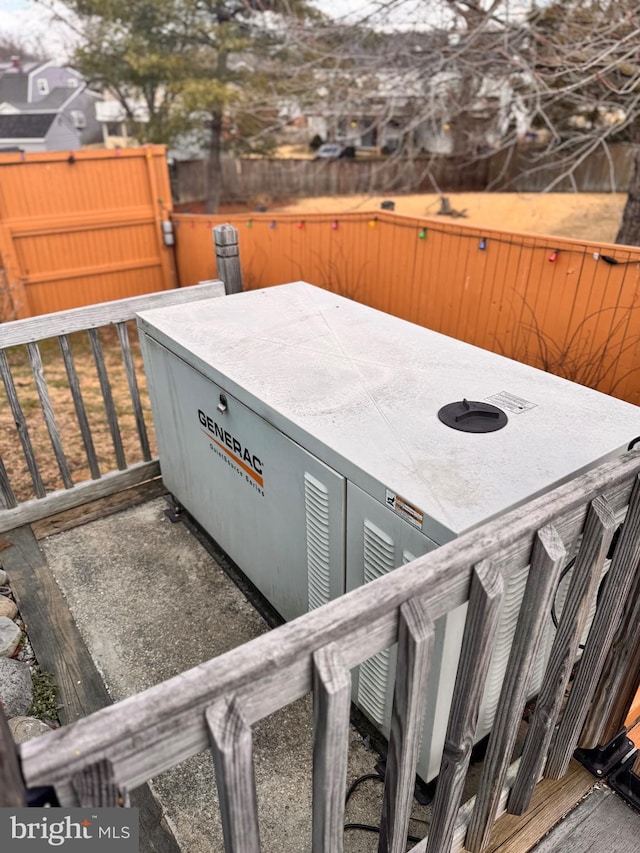 exterior details with a power unit and fence