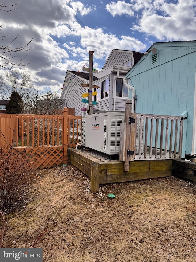 view of yard with a wooden deck