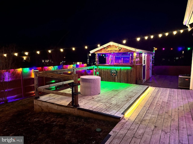 view of deck at twilight