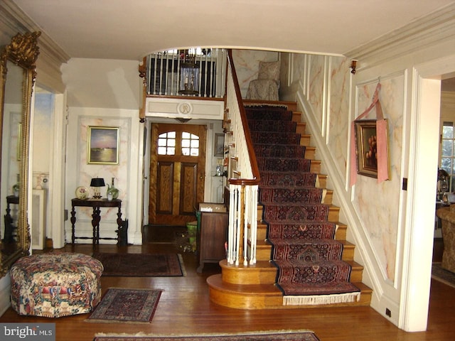 entrance foyer featuring hardwood / wood-style floors