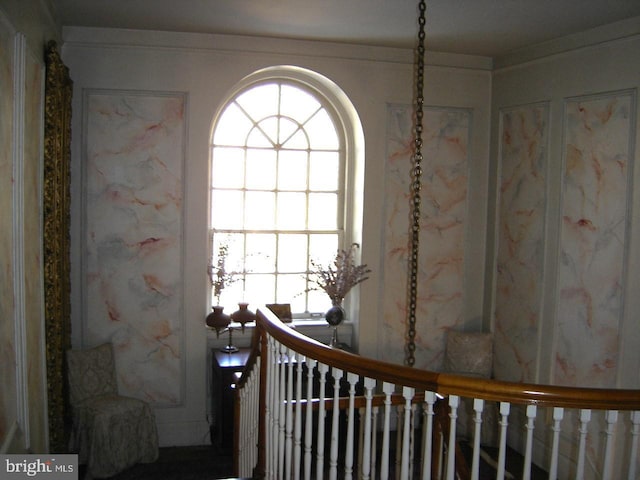 staircase with plenty of natural light