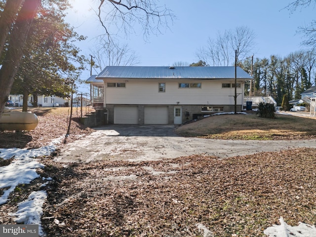 view of side of property featuring a garage