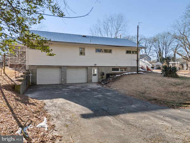 exterior space featuring a garage