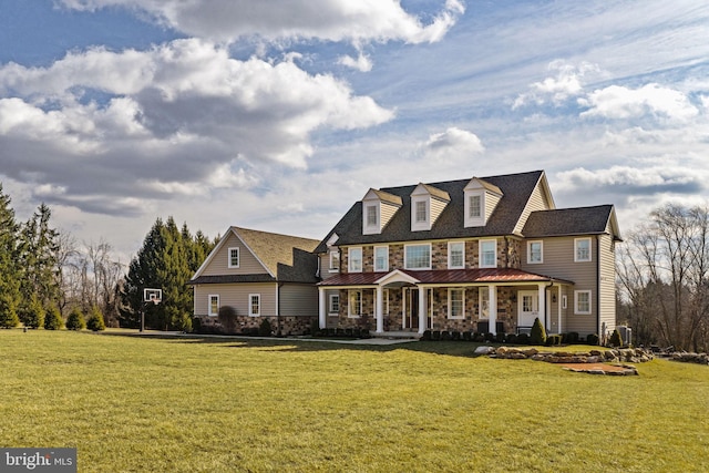 view of front facade with a porch and a front lawn