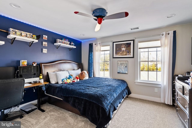 carpeted bedroom featuring ceiling fan