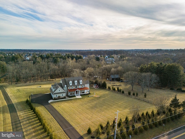 birds eye view of property featuring a rural view