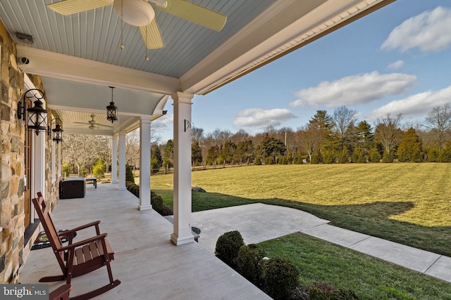 view of patio / terrace featuring ceiling fan