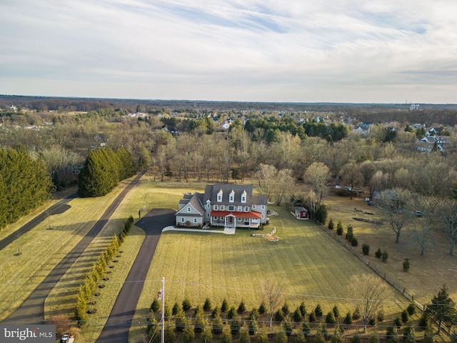 birds eye view of property featuring a rural view