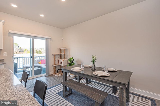 dining room featuring wood-type flooring