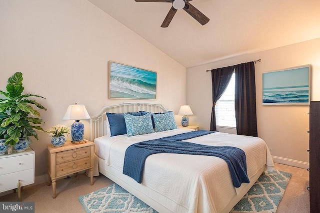 bedroom featuring lofted ceiling, carpet, and ceiling fan