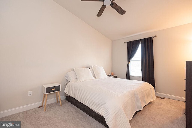 carpeted bedroom with lofted ceiling and ceiling fan