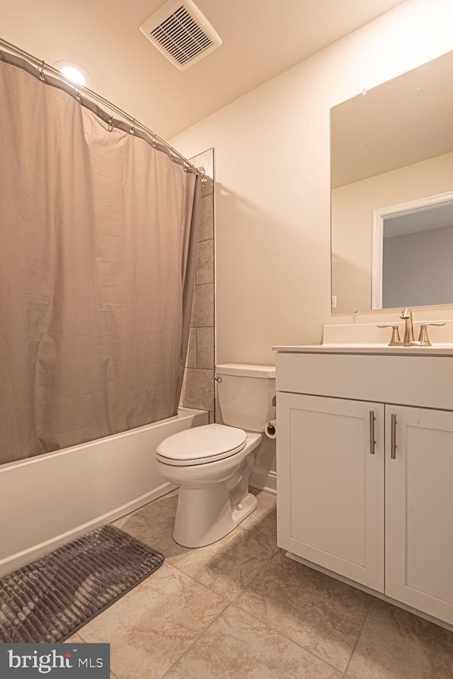 full bathroom with vanity, toilet, and shower / bath combo