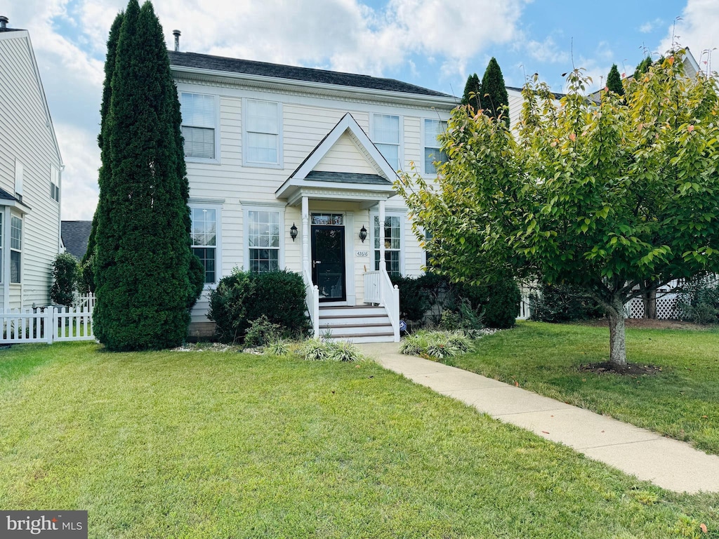 view of front of home with a front yard